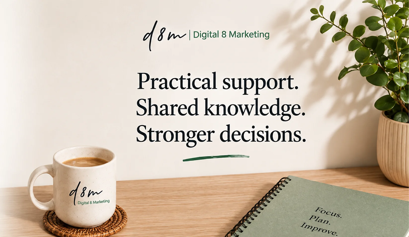 Digital 8 Marketing workspace with notebook and coffee mug